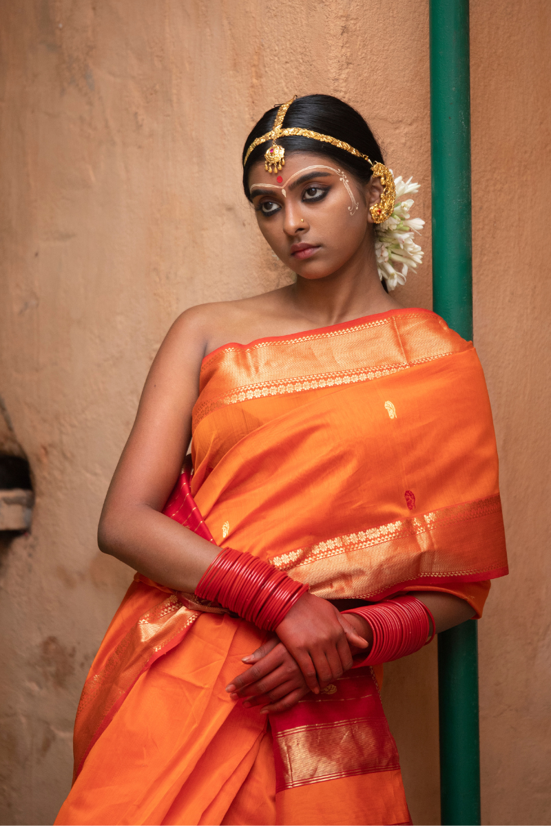 Kesariya - Indiestore Orange Handloom Maheshwari Saree with Golden Red Border