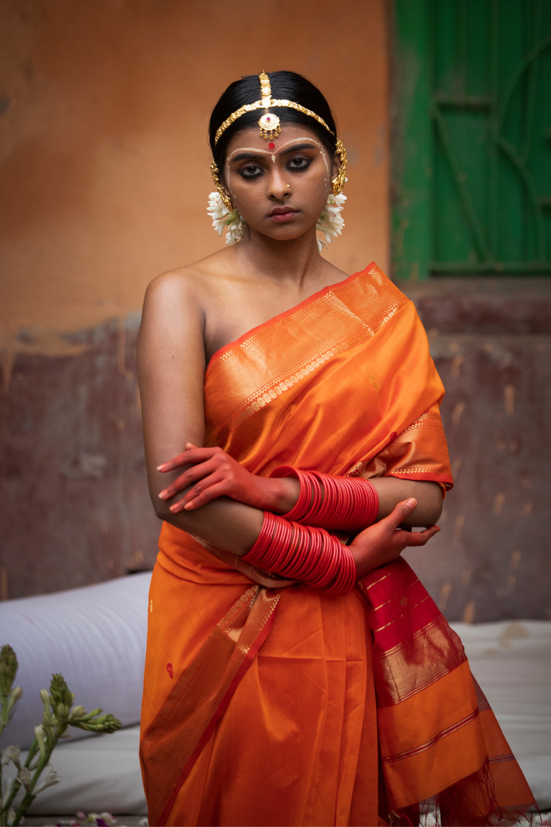 Kesariya - Indiestore Orange Handloom Maheshwari Saree with Golden Red Border